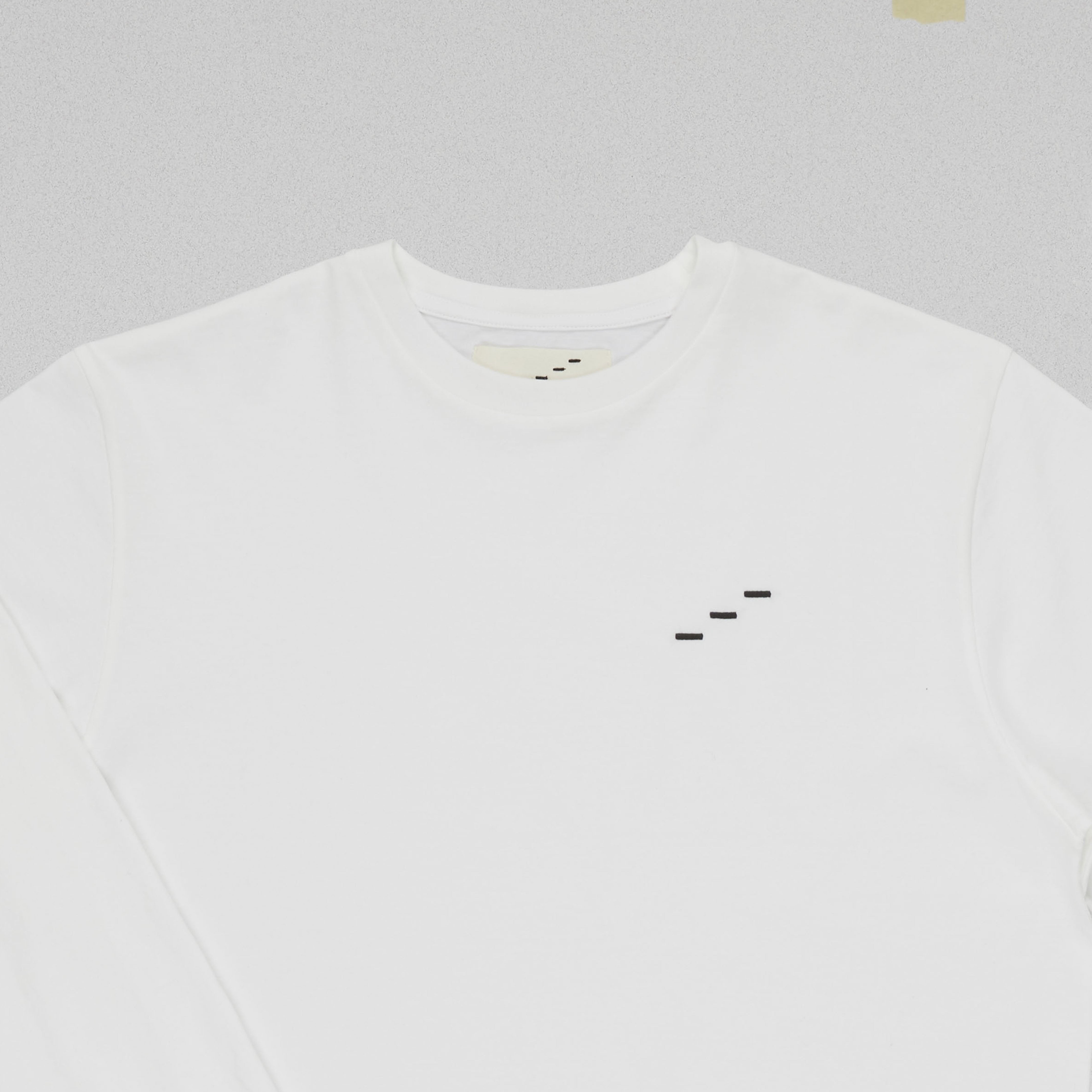 HYPHENS LONG SLEEVE T-SHIRT STILL LIFE DETAIL